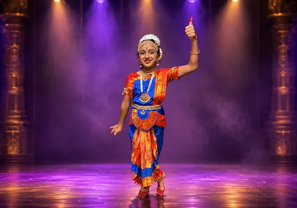 Two Bharatanatyam students in Namaskaram pose during a Spotlight Academy showcase, The Woodlands TX