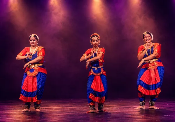 Bharatanatyam ensemble of three dancers performing in unison at Spotlight Academy, The Woodlands TX