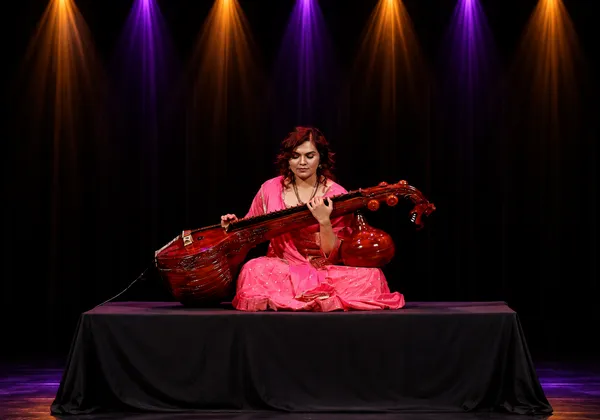Veena students performing at Spotlight Academy community event