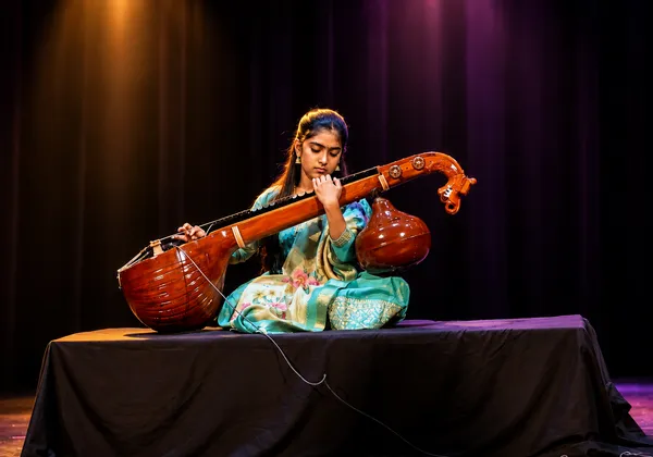 Veena students performing on stage at a Spotlight Academy showcase
